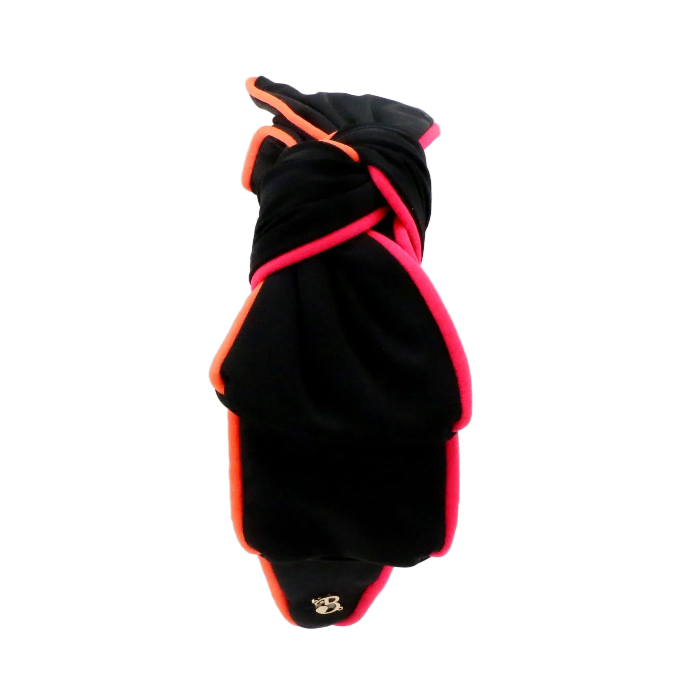 A black Neoprene headbandwith bright pink and orange trim, folded and photographed on a clean white background.