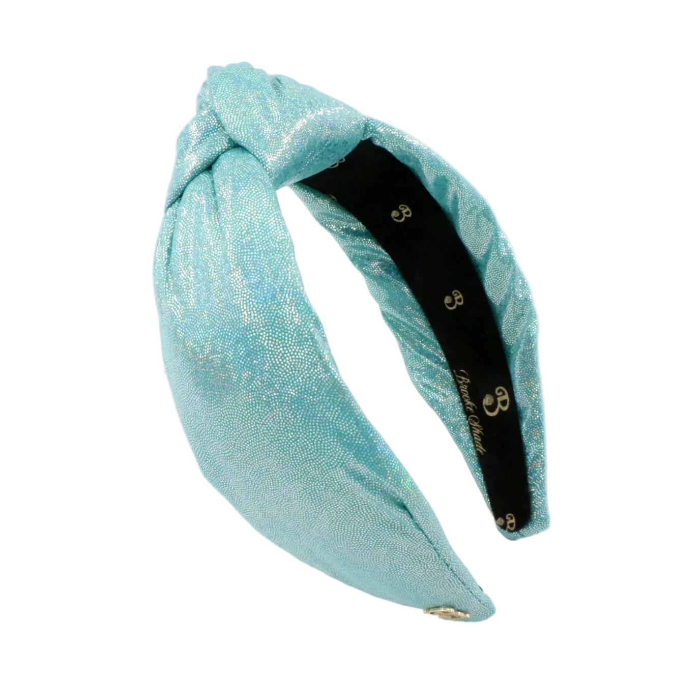 A metallic light blue fabric headband with a knotted twist design, featuring a black inner band with gold logo details, set against a plain white background.