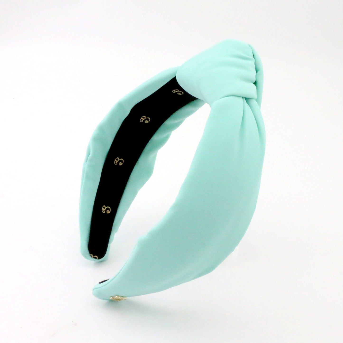 Ice Blue headband with a knot on a white background