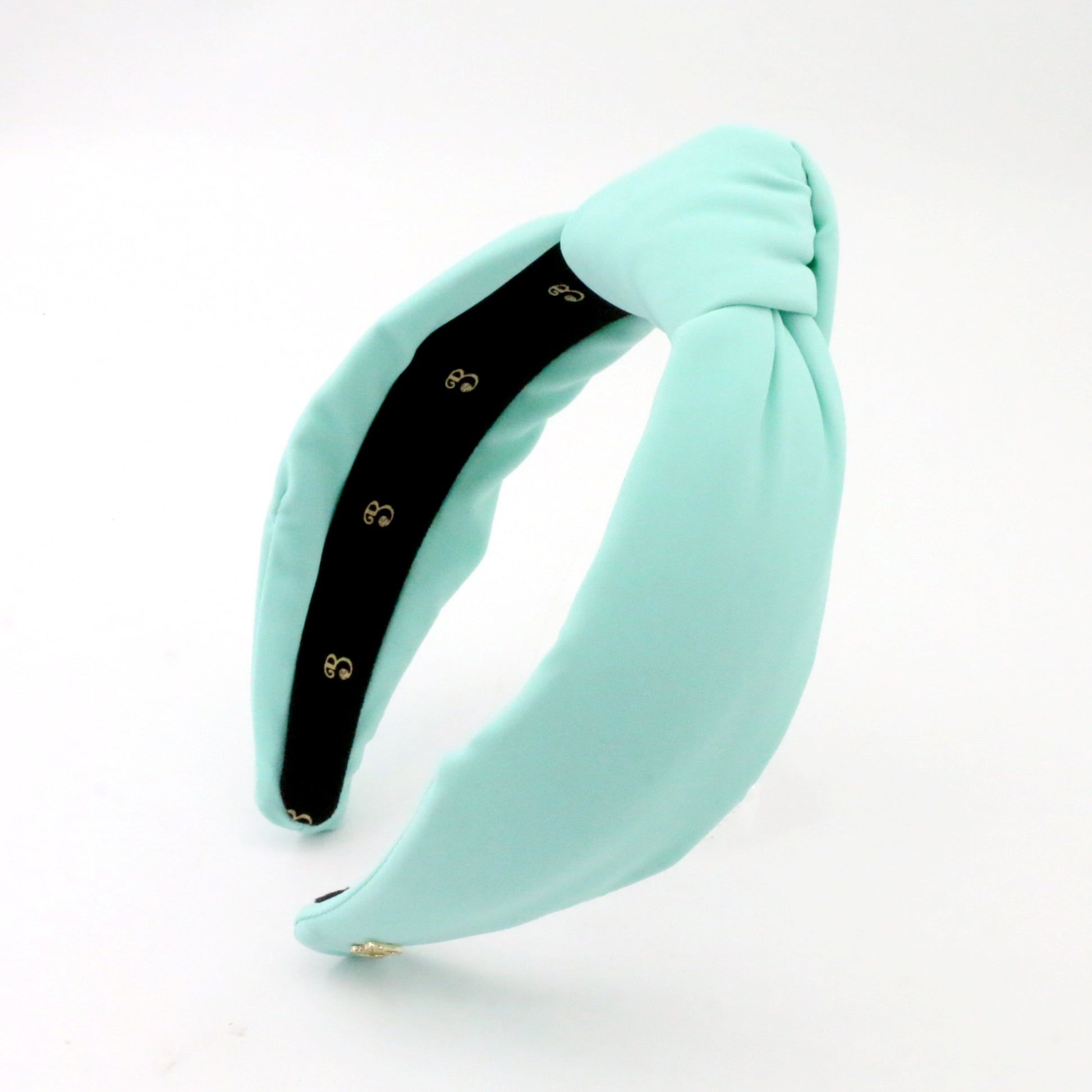 Ice Blue headband with a knot on a white background