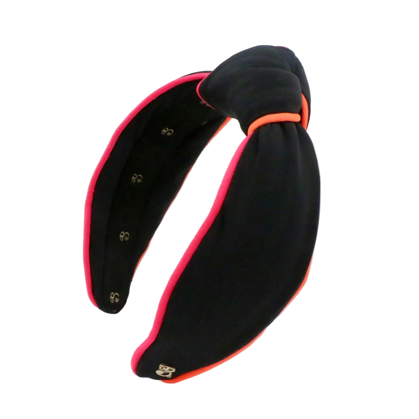 Black headband with pink interior and trim on a white background