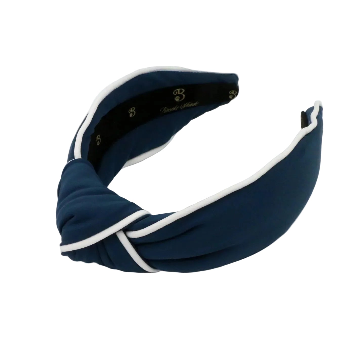 Navy blue headband with white trim on a light gray background