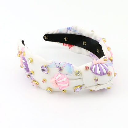 The Seashell Bow Rhinestone Topknot
