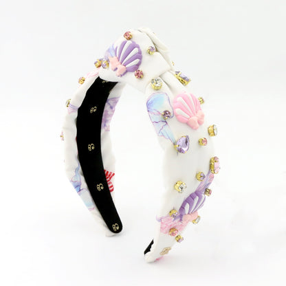The Seashell Bow Rhinestone Topknot