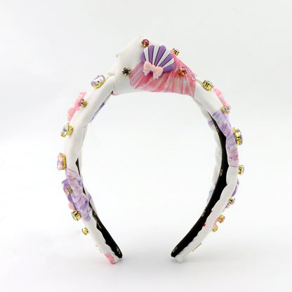 The Seashell Bow Rhinestone Topknot