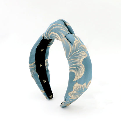 The Art Deco Blue & Gold Topknot