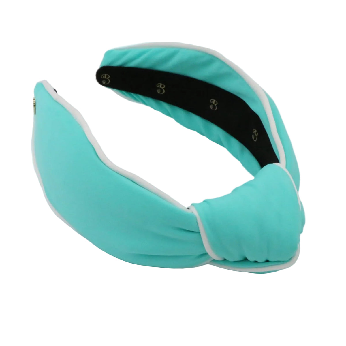 Turquoise headband with a black band on a light gray background
